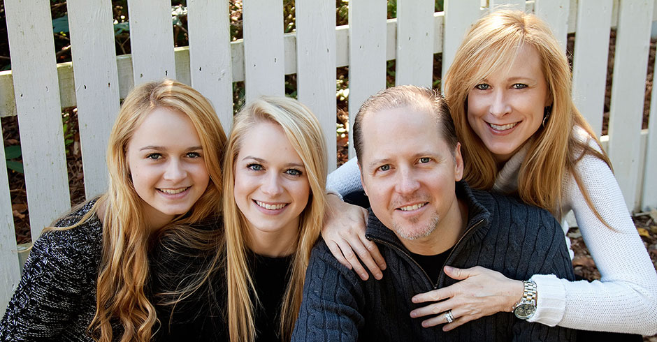 Family by Fence